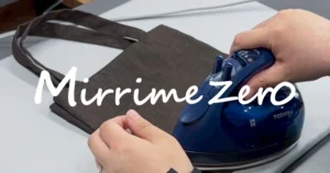 就労継続支援A型事業所で利用者さんが職員と共に手提げバッグを制作している様子